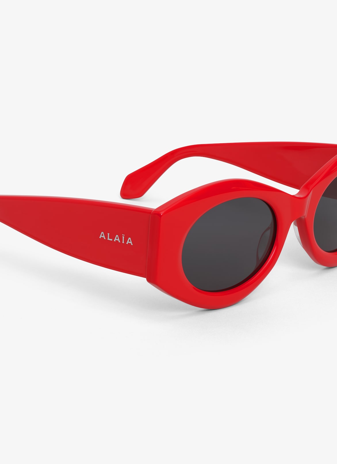 LUNETTES DE SOLEIL OVALES ALAÏA ROUGE LUNETTES DE SOLEIL OVALES